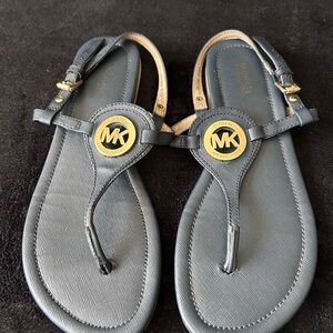 Michael Kors Navy Thong Sandals with Gold MK Medallions